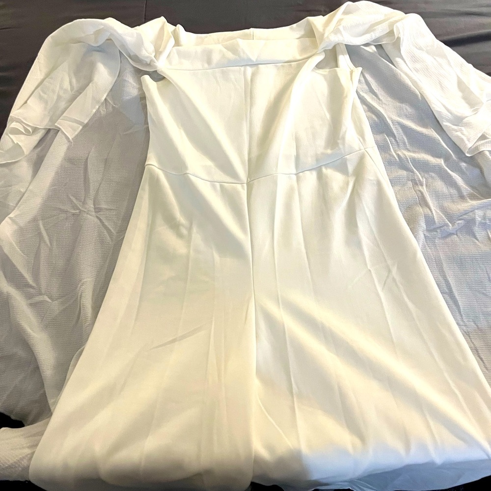 White one piece jumpsuit.